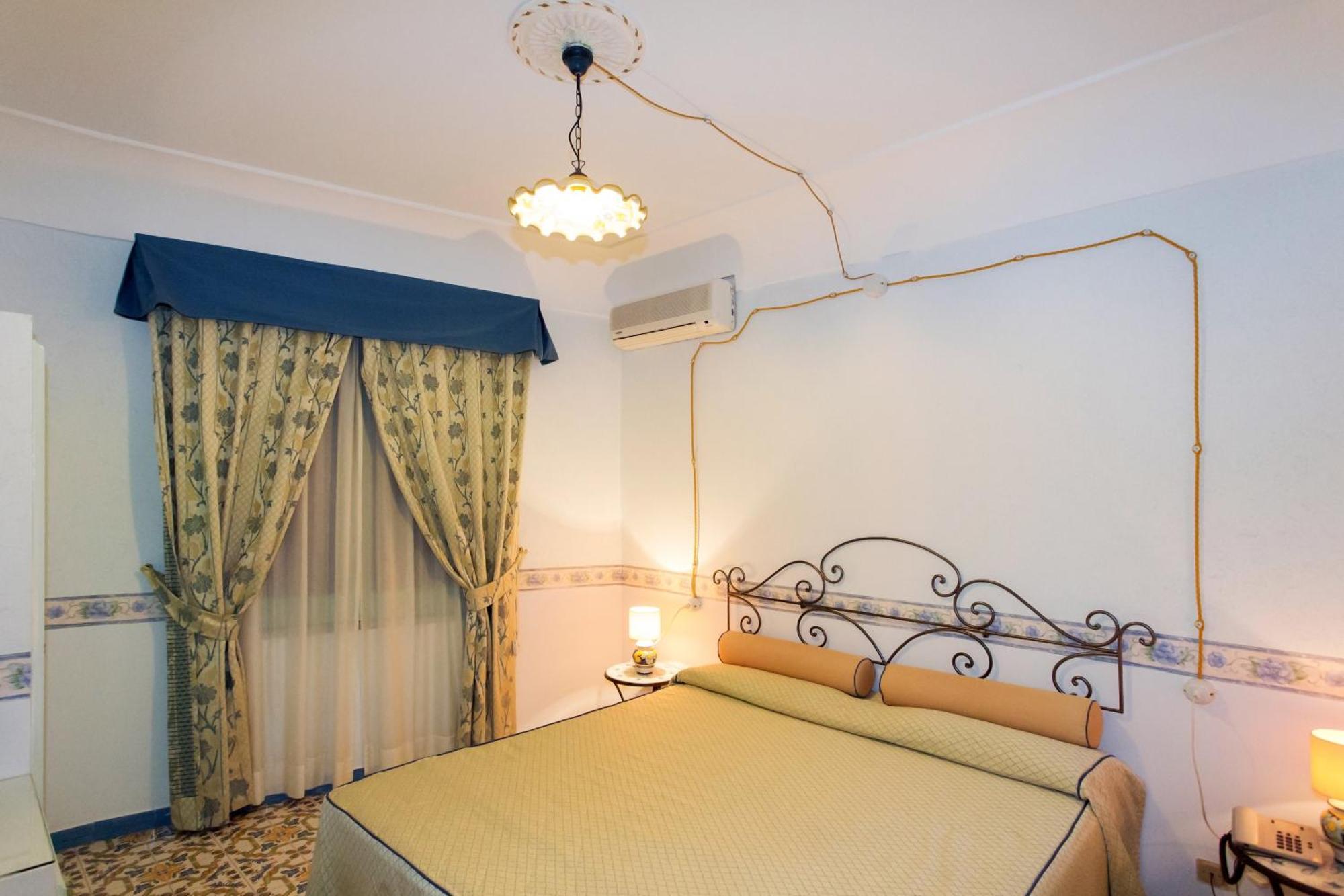 Отель Fico D'India Relais Фуроре Номер фото
