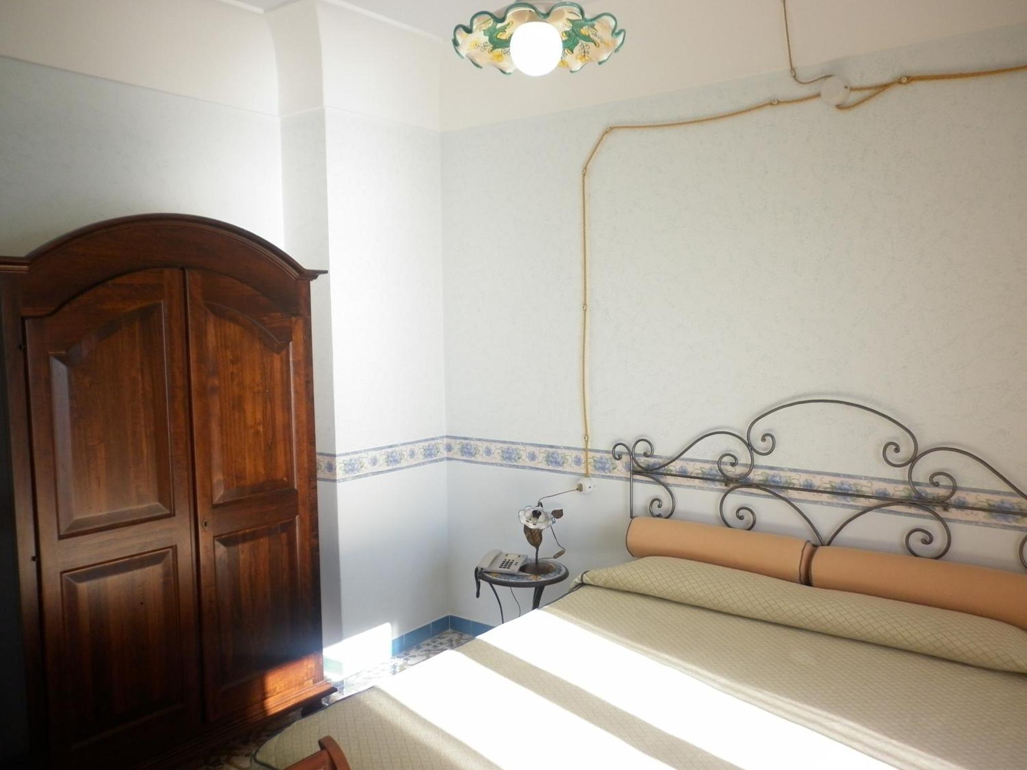 Отель Fico D'India Relais Фуроре Номер фото